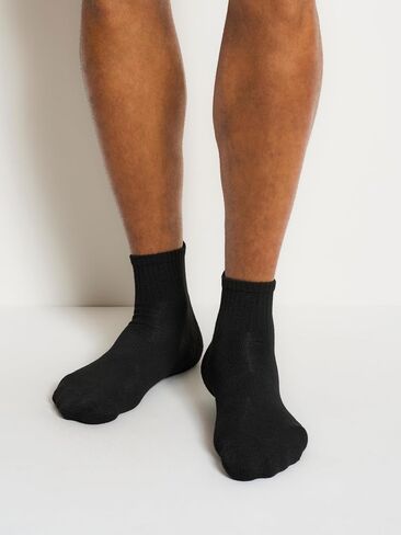 DKNY Men's 6 Pack Sport Cushion High Quarter Crew Socks in Saudi Arabia