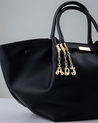 PAVOI 14K GOLD PLATED BROBBLE LEATH CARM FOR HANDBAGS - GOLD ORFIRE INFORME in Saudi Arabia