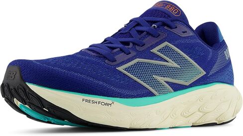 New Balance Men's M880A14 Running Shoe, Inkwell/Cyber Jade/Dark Silver Metallic, 9 in Saudi Arabia