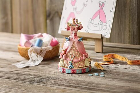 Enesco Disney Traditions Collection by Jim Shore Cinderella Pink Dress Musical Figurine- Stone Resin Hand Painted Collectible Disney Figurines Cinderella's Dress with Music Home Decor Statue, 8.4 Inch in Saudi Arabia