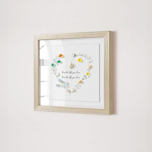 Seahorizon heart-shaped. Handmade Sea Glass Art Wall Decor, 8 x 8 Inch Wood Framed Wall Art, Made of Sea Glass, Shells, and Pebbles in Saudi Arabia