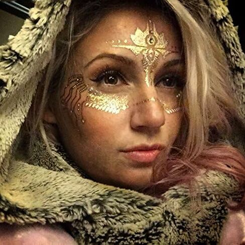 وشم ذهبي مؤقت من Golden Ratio Tats، طلاء وجه المهرجان، وشوم تنكرية باللونين الذهبي والأبيض (قناع CirquiTree) in Saudi Arabia