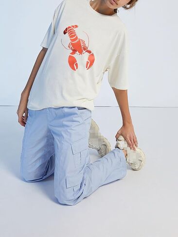 Oversized Graphic Tees for Women Y2k Short Sleeve Ocean/Shark Baggy Shirt Cute Crewneck Aesthetic Preppy Clothes in Saudi Arabia