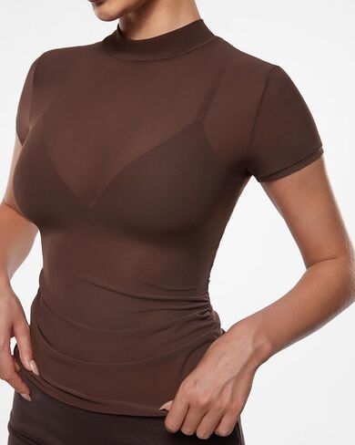 INLYRIC Women's Cosnufy Mesh Sheer Short Sleeve Shirts See Through Mock Neck Ruched Summer Going Out Tops Sexy Tees in Saudi Arabia