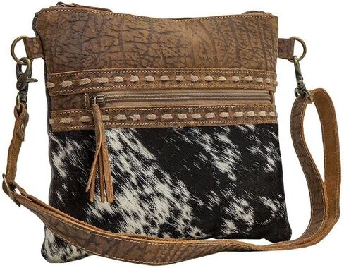 Myra Diaz Cowhide Purse - Black and White Cowhide Purses with Brown Tooled Leather Design, Adjustable Shoulder Strap in Saudi Arabia