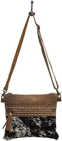 Myra Diaz Cowhide Purse - Black and White Cowhide Purses with Brown Tooled Leather Design, Adjustable Shoulder Strap in Saudi Arabia