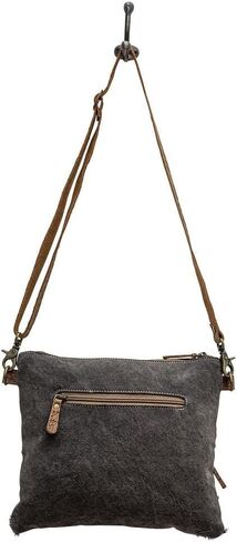 Myra Diaz Cowhide Purse - Black and White Cowhide Purses with Brown Tooled Leather Design, Adjustable Shoulder Strap in Saudi Arabia
