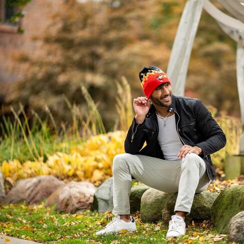 Mad Engine Chester Cheetos Beanie Hat Fire Breather Pom Winter Cuffed Beanies in Saudi Arabia