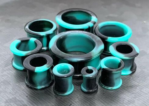 زوج من Teal & Black Combliv Galaxy Silicone Double Flare Tunnel - مقاييس المقابس - مجوهرات الجسم in Saudi Arabia