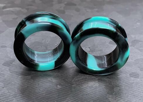 زوج من Teal & Black Combliv Galaxy Silicone Double Flare Tunnel - مقاييس المقابس - مجوهرات الجسم in Saudi Arabia