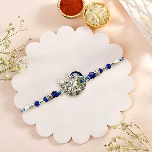 مجموعة Rakhi التقليدية من 3 لراخشا بانهان - خيوط مصممة راخي التي تضم الطاووس والسلحفاة ورودراكشا - حزمة هدايا احتفالية مصنوعة يدويًا in Saudi Arabia