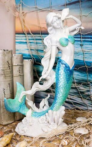Ebros Gift Large Nautical Capiz Blue Tailed Mermaid Ariel by White Coral Rocks Statue Ocean Aquamarine Princess As Coastal Beach Under The Sea Decorative Accent (Listening to A Conch) in Saudi Arabia