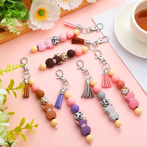 12 أجهزة كمبيوتر Highland Cow Beychains لطيف Highland Cow Cow Beadedchains Hovely Party Party Favors تبادل هدايا استحمام الطفل مع شرابة للنساء هدايا الرجال in Saudi Arabia