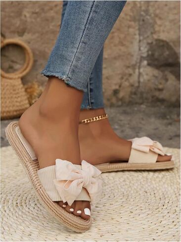 MakeMeChic Women's Bow Straw Flat Sandals Round Open Toe Beach Slip on Sandals in Saudi Arabia