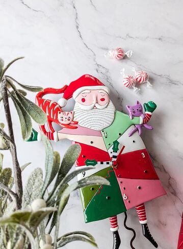 Enesco Allen Designs Crazy Cat Santa Wall Clock - Battery Operated Pendulum Analog Clock, Stone Resin Decorative Clocks for Walls Home Decor Kitchen Clock, 12.6 Inch in Saudi Arabia