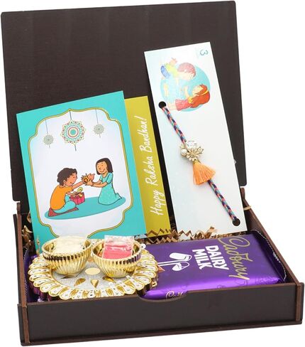 Rakhi Gift Box | Rakhi Gift Hamper made with a Blue and Gold Rakhi, Roli, Chaval, Mini Thali Set, and a Greeting Card and a delectable | Rakhi Gift Set | Rakhi Hamper (Rakhi Set 5) in Kuwait