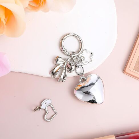 سحر الأكياس الفضية للنساء - القمة المعدنية على شكل قلب قلادة Kawaii Keychain لمحفظة حقيبة اليد حقيبة الهاتف in Saudi Arabia