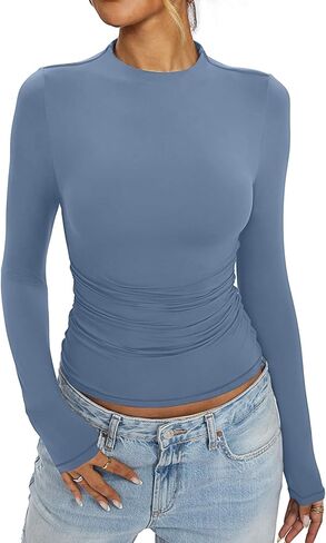 قمصان نسائية ذات رقبة وهمية وأكمام طويلة مكشكشة واصطف مزدوجًا ملابس خريفية ضيقة بياقة مدورة 2024 in Kuwait