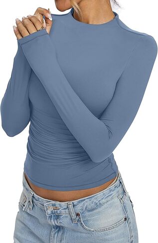 قمصان نسائية ذات رقبة وهمية وأكمام طويلة مكشكشة واصطف مزدوجًا ملابس خريفية ضيقة بياقة مدورة 2024 in Kuwait