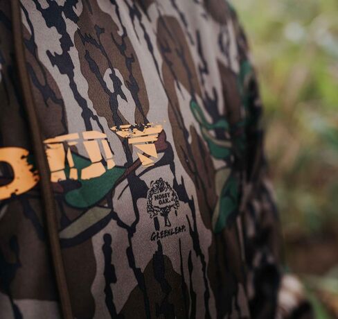 سترة Muddy Outdoors الرجالية ذات القلنسوة ذات الأداء القياسي TRX/Mossy Oak Bottomland / 3X in Kuwait
