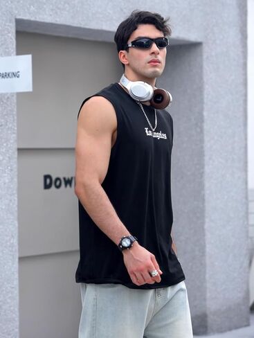 Oyoangle Men's Letter Praphic Print Tank Top Crew Neck Clisteress Tops Summer Tops Streetwear in Kuwait