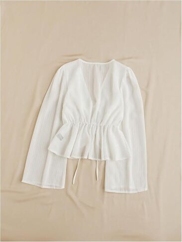 قمادة تربط تربط الأفق العفومة بلوزة الكشكش غير المتكافئة. in Kuwait