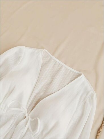 قمادة تربط تربط الأفق العفومة بلوزة الكشكش غير المتكافئة. in Kuwait