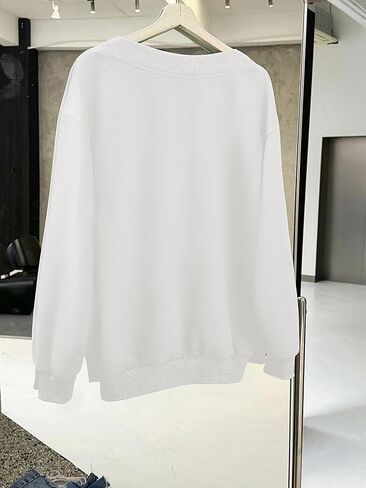 WDIRARA Women's V Neck Letter Graphic Oversized Sweatshirt Long Sleeve Drop Shoulder Pullover Top in Saudi Arabia