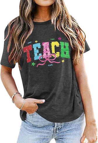 القمصان المعلمين النساء في اليوم الأول من المدرسة tshirt مساعدة القليل in Saudi Arabia
