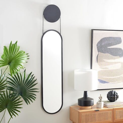 SAFAVIEH Home Collection Aistina Mid-Century Modern Matte Black 13 x 61-inch Oval Decorative Accent Wall Mirror for Bedroom Living Room Entryway in Saudi Arabia