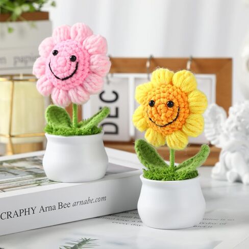H&W 2PCS ابتسامة نابضة بالحياة كروشيه عباد الشمس الزهور الاصطناعية ، مثالية لمكتب مكتب لوحة القيادة والسيارة ، هدايا عيد ميلاد عيد الأم المثالية ، الساحرة (الذهبي والوردي) in Saudi Arabia