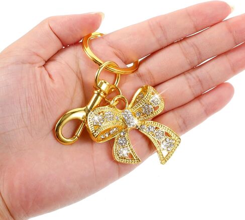 Rhinestone Bow keychain للنساء ، سحر حقيبة القوس اللامعة ، سحر الأنيقة الذهبية والفضية ، سلسلة مفاتيح أزياء لحقيبة ظهر محفظة (ذهبية) in Kuwait