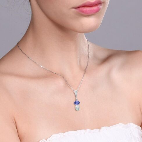 Gem Stone King 925 Sterling Silver Blue Tanzanite and White Simulated Opal Pendant Necklace For Women (2.28 Cttw, Gemstone December Birthstone, Oval 8x6MM, with 18 Inch Chain) in Saudi Arabia