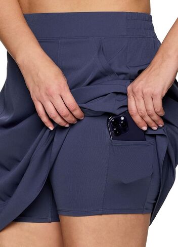 تنورة RBX مقاس كبير بطول أطول للسيدات تنورة جولف منسوجة سريعة الجفاف مع جيوب للتنس والمشي لمسافات طويلة والجري in Saudi Arabia