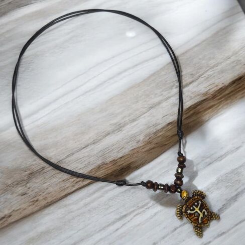 LAVIP Hawaiian Sea Turtle Pendant Surfer Necklace Adjustable Cord Necklace in Brown, White, and Black for Men & Women in Saudi Arabia