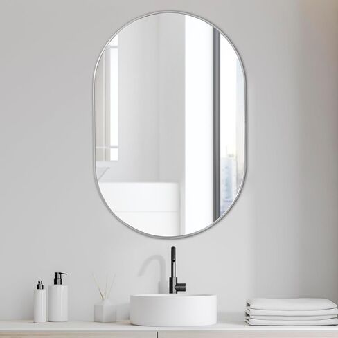 JONATHAN Y MIR202C Milly 24 in. W x 36 in. H Medium Oval Metal Framed Wall Mirror, for Bathroom, Living Room, Bedroom, Gold in Saudi Arabia