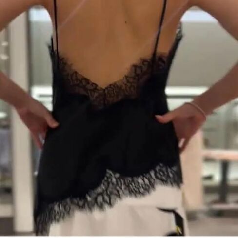 Women’S Casual Solid Lace Spaghetti Strap Top With Patchwork Irregular Hole Decoration in Saudi Arabia