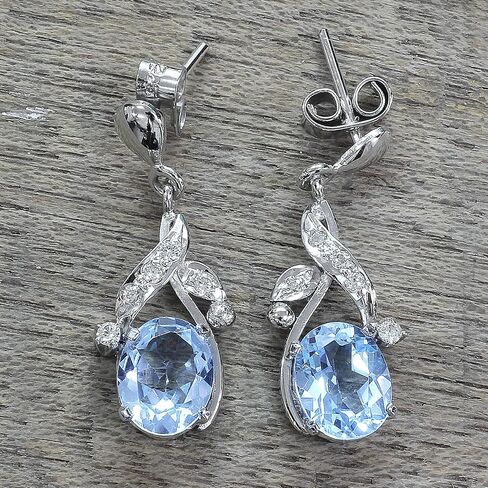 NOVICA Artisan Handcrafted Blue Topaz Dangle Earrings Sterling Silver Floral Jewelr Rhodium Plated Cubic Zirconia Clear India Leaf Tree Birthstone [1 in L x 0.4 in W x 0.2 in D] ' Dazzling Dew' in Saudi Arabia