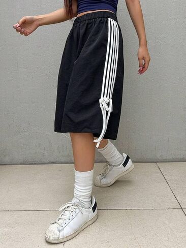 Obenie Women Baggy Striped Athletic Shorts Y2K Side Stripe Baggy Bermuda Shorts Summer Knee Length Wide Leg Shorts in Saudi Arabia