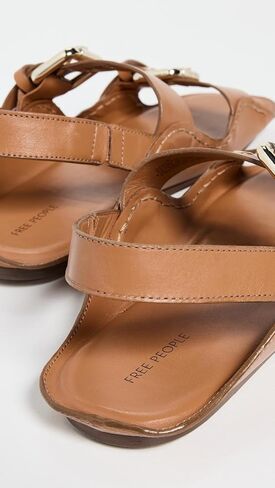 Women's Blossom Buckle Sandal Flat, Black Leather, 9.5 in Saudi Arabia