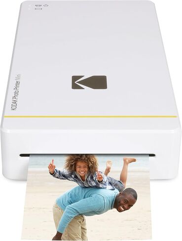 طابعة الصور الفورية المحمولة Kodak Mini - متوافقة مع Wi-Fi وNFC - تطبع صورًا مقاس 2.1 × 3.4 بوصة لاسلكيًا، تقنية طباعة DyeSub المتقدمة (أبيض) متوافقة مع Android وiOS in Kuwait