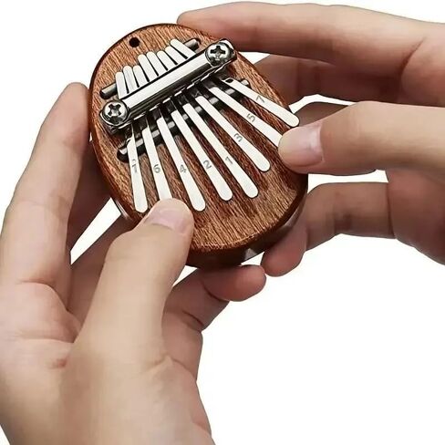 8 Key Mini Wood Kalimba رائعة إصبع الإبهام البيانو الماريمبا الموسيقي الإكسسوارات الجيدة هدية in Saudi Arabia
