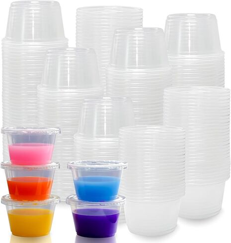 2oz Crystal Jello Shot Cups with Lids 100 Set, Leakproof & Freezer Safe Small Meal Prep Plastic Portion Cups for Salad Dessert Condiment Sauce Souffle, Food Storage Cups for Lunch Party Trips in Saudi Arabia