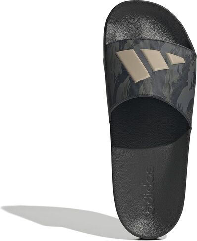 Adidas للجنسين Adilette Slide Slide Slide ، أبيض/أسود/أسود ، 11 رجلاً أمريكي in Kuwait