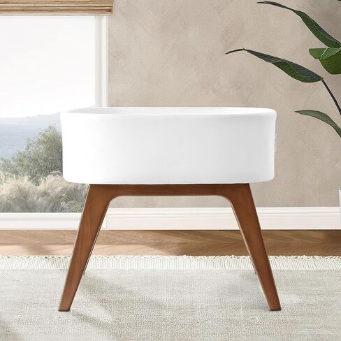 Delta Children Rockaway Rocking Bassinet - Portable Baby Crib with Solid Wood Feet, Organic GOTS Certified Performance Fabric Exterior, Breathable Interior, Includes Mattress Pad & Fitted Sheet, Ivory in Kuwait