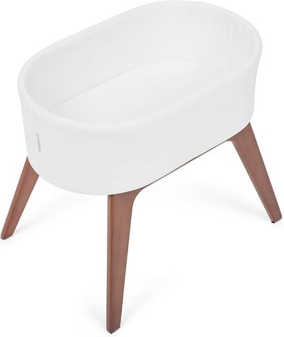 Delta Children Rockaway Rocking Bassinet - Portable Baby Crib with Solid Wood Feet, Organic GOTS Certified Performance Fabric Exterior, Breathable Interior, Includes Mattress Pad & Fitted Sheet, Ivory in Kuwait