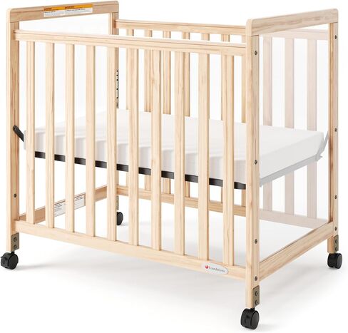 Foundations SafetyCraft Compact Slatted Daycare Crib, Durable Wood Construction, Non-Marking Casters (2 Locking), Includes 3" InfaPure Foam Mattress (Natural) in Kuwait