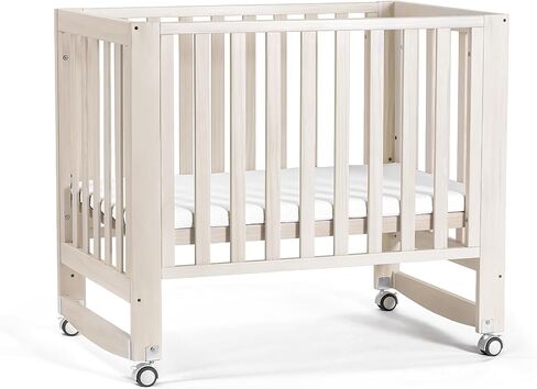 MAMAZING EvoNest 6-in-1 Convertible Baby Mini Crib with Wheels | GREENGUARD Gold Certified, New Zealand Pine Wood, 4 Adjustable Heights, Rocking Mode, Small Spaces Design, Washed Natural in Saudi Arabia