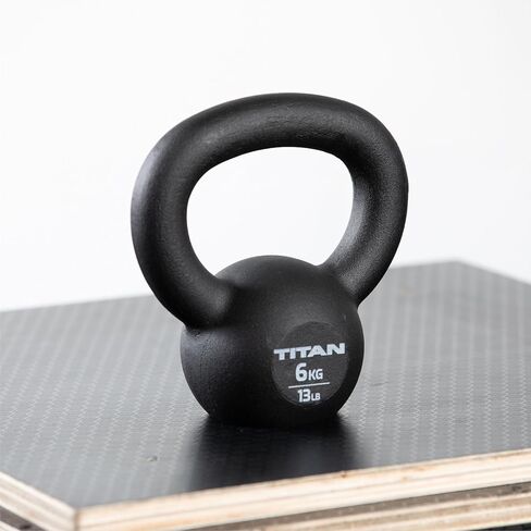 Titan Fitness Cast Iron Kettlebell ، قطعة واحدة من العلامات ، KG و LB ، تمرين كامل الجسم in Saudi Arabia