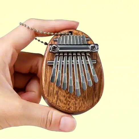 Mini Kalimba Thumb Piano 8 Keys ، بيانو أصابع الماهوغوني المحمولة مع حقيبة حمل ، مطرقة ، تعليم ، هدية موسيقية للمبتدئين والكبار in Saudi Arabia